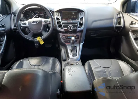 2014 Ford Focus Titanium z USA, uszkodzony, nr VIN 1FADP3N29EL180325